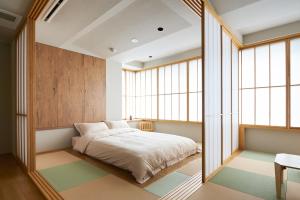 Lova arba lovos apgyvendinimo įstaigoje LiveGRACE Hotel Akasaka 赤坂