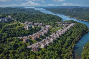 an aerial view of a resort complex next to a river at Eagle Nest Resort Pristine Dream in Branson