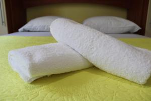 Postel nebo postele na pokoji v ubytování Apartments Renata