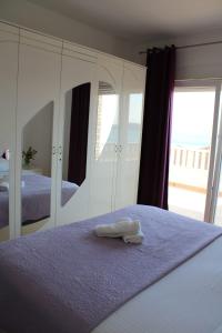 Postel nebo postele na pokoji v ubytování Apartments Renata