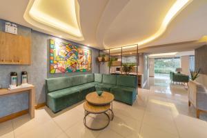 Χώρος καθιστικού στο Hotel Laghetto Premio