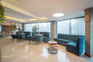 Χώρος καθιστικού στο Hotel Laghetto Premio +36 φωτογραφίες
