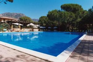 Swimming pool sa o malapit sa Santa Margherita di Pula, Calaverde, Deliziosa villetta 100 metri dal mare