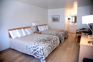 Letto o letti in una camera di The Virginian Inn Moab Downtown