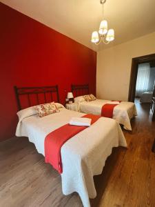 Postel nebo postele na pokoji v ubytování Casa Rural la Abuela Amelia