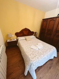 Postel nebo postele na pokoji v ubytování Casa Rural la Abuela Amelia