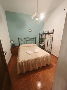 Ein Bett oder Betten in einem Zimmer der Unterkunft Casa Rural la Abuela Amelia