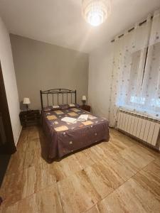 Postel nebo postele na pokoji v ubytování Casa Rural la Abuela Amelia
