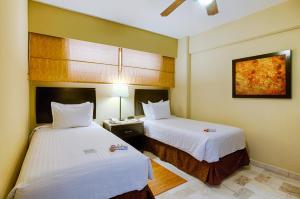 Voodi või voodid majutusasutuse Barceló Puerto Vallarta - All Inclusive toas