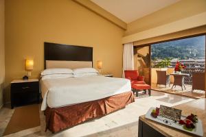 Voodi või voodid majutusasutuse Barceló Puerto Vallarta - All Inclusive toas