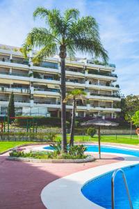 Photo de la galerie de l'établissement Moderno Apartamento en Guadalmina Golf - Marbella, à Marbella