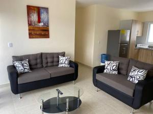 Posezení v ubytování New Condo in Higuey - Long Term Monthly Stay!