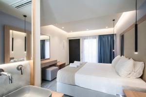 Postel nebo postele na pokoji v ubytování ALTHAEA LUXURY ROOMS