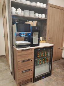 Kuchyň nebo kuchyňský kout v ubytování Vvinn Hotel