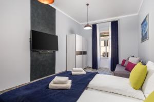 Кровать или кровати в номере Apartments Piccola Venezia