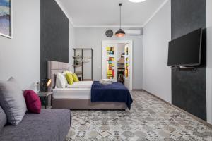 Кровать или кровати в номере Apartments Piccola Venezia