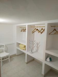 Postel nebo postele na pokoji v ubytování Kalymnos Gallery