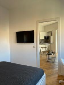 Televízia a/alebo spoločenská miestnosť v ubytovaní CASA di ANITA