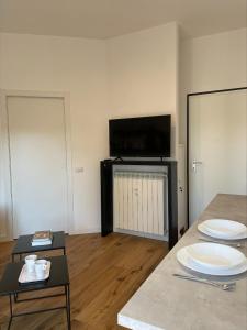 Televízia a/alebo spoločenská miestnosť v ubytovaní CASA di ANITA