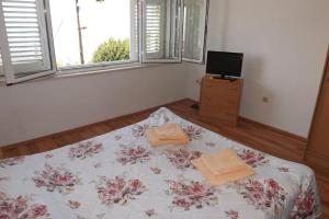 Llit o llits en una habitació de Studio Apartment Bupić- Close to Old City with Free Parking