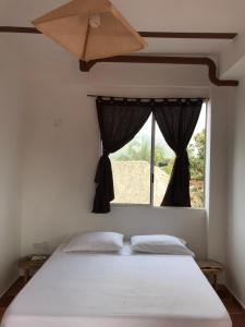 Кровать или кровати в номере Donama River