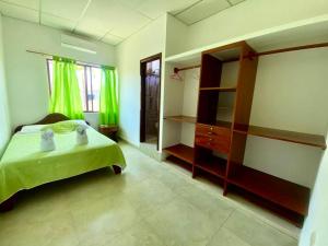 Postel nebo postele na pokoji v ubytování Hostal Punta Arena
