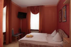 Postel nebo postele na pokoji v ubytování Hotel Sessellift