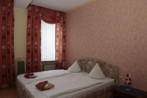 Postel nebo postele na pokoji v ubytování Hotel Sessellift