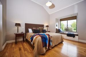 Krevet ili kreveti u jedinici u okviru objekta Parehua Resort