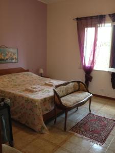 Ліжко або ліжка в номері Villa Mariapia