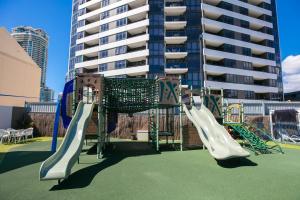 a playground with a slide at Paradise Resort Gold Coast in Gold Coast