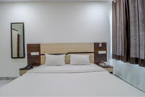 Posteľ alebo postele v izbe v ubytovaní FabHotel Casa