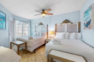 Ένα ή περισσότερα κρεβάτια σε δωμάτιο στο Gulf Shores Plantation West 1254