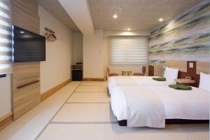 Postel nebo postele na pokoji v ubytování Kyonoyado Kiyomizu Gojo Kuretakeso + 138 fotografií