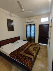 Letto o letti in una camera di Varah Square Guest House