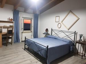 Postel nebo postele na pokoji v ubytování Nottola B&B