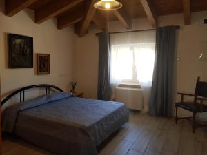 Postel nebo postele na pokoji v ubytování Nottola B&B