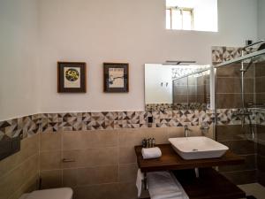 Vonios kambarys apgyvendinimo įstaigoje Relais Villa Alma
