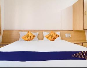 Postel nebo postele na pokoji v ubytování Hotel Rahi