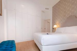 Posteľ alebo postele v izbe v ubytovaní Genteel Home Goyeneta