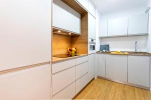 Kuchyňa alebo kuchynka v ubytovaní Genteel Home Goyeneta + 15 fotografií