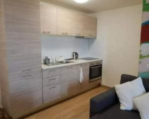 Kuchyň nebo kuchyňský kout v ubytování MILOS HOUSE