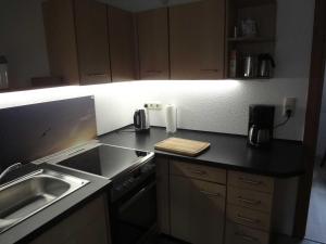 Kuchyň nebo kuchyňský kout v ubytování Ferienwohnung Hansen in Hafennähe