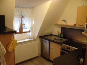 Kuchyň nebo kuchyňský kout v ubytování Ferienwohnung Hansen in Hafennähe