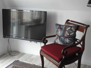 TV a/nebo společenská místnost v ubytování Ferienwohnung Hansen in Hafennähe