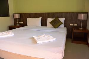 Postel nebo postele na pokoji v ubytování PS 2 Resort Phuket Patong - SHA Plus