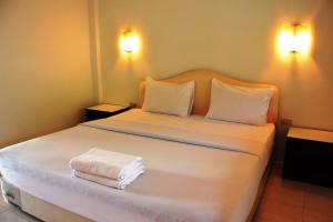 Postel nebo postele na pokoji v ubytování PS 2 Resort Phuket Patong - SHA Plus