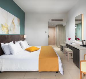 Postel nebo postele na pokoji v ubytování Mayfair Hotel