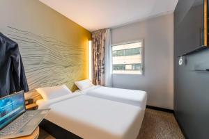 Postel nebo postele na pokoji v ubytování B&B HOTEL Brest Centre Port de Commerce
