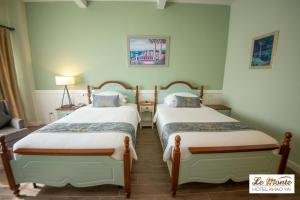 A bed or beds in a room at Le Monte Khao Yai